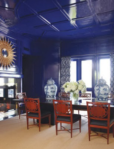 Carolyn Roehm loves blue and white and has even written a  book on the subject.  These high lacquer walls somehow work counterbalanced with bold urns, mirror and scale of room.
